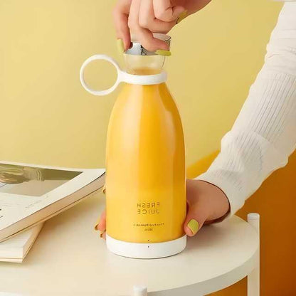 Yellow juice bottle with a person opening it against a yellow background