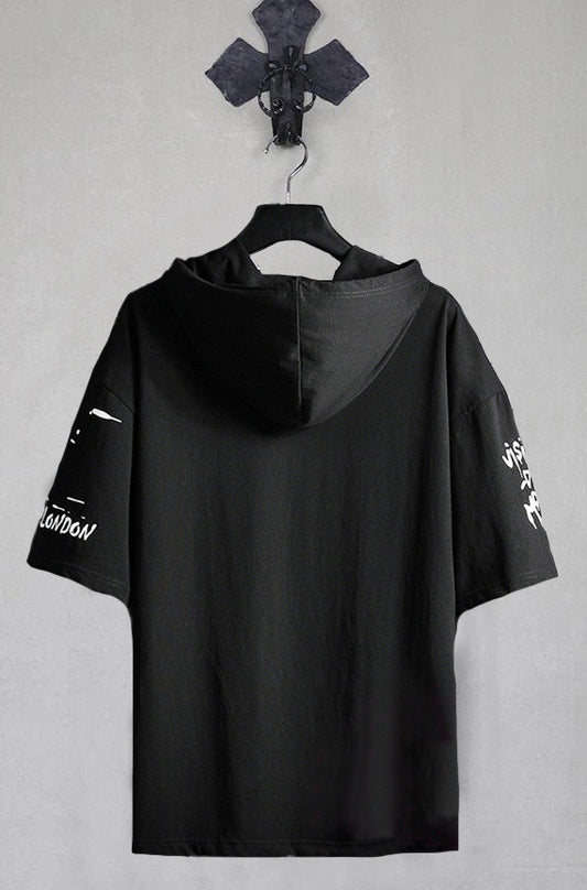 Black t-shirt with text on sleeves and back, hanging against a gray background