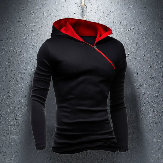 Black hoodie with red lining on a gray textured background